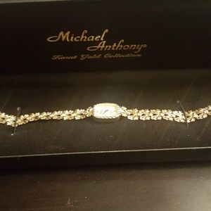 14karat gold diamond cut watch by Michael Anthony